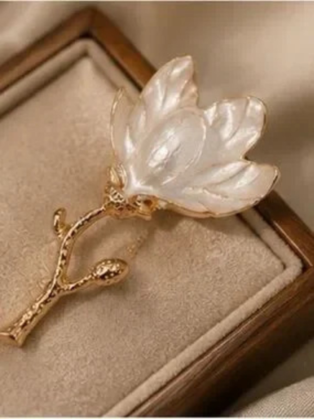 Magnolia Pearl Botanical Brooch with Sculptural Gold Stem